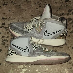 Nike Gray and Cream Athletic Shoes with Modern Design